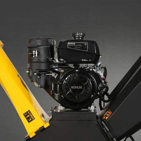 Side view of the 429cc KOHLER engine on the Towable 5 Inch Gas Powered Wood Chipper Shredder Mulcher With Electric Start And Emergency Stop Button Powerhouse 429cc Kohler 14HP Engine 12V 20Ah Battery Handles Up To Five Inch Branches Tow Bar Model GS1500 Black.