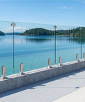 No Sweat Install Frameless Glass Railing Kit Featuring Six Clear Laminated Tempered Panels at 44 inches high overlooking water view.