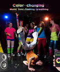 Dancers in vibrant clothes using Solar Powered Outdoor Spotlight Lights Color Changing RGB Alexa and Google Assistant compatible.