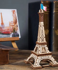 Paris Tower 3D Puzzle Kit No Glue Needed, 50 Wooden Pieces, 7.08 Inch Tall, Brown Finish, Easy Build For DIY Enthusiasts And Collectors, World Cities Collection, Fun Desk Model For Kids And Adults. Wooden Eiffel Tower model on desk
