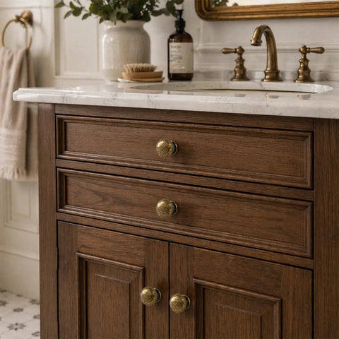 8 Piece Antique Brass Cabinet Knobs Set on wooden bathroom vanity, sleek round drawer pulls for dressers, cabinets, bathrooms and closets.