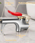 Close-up of steel blow gun nozzle with red handle, showcasing adjustable features for Four Sets Industrial Air Blow Gun Kits With Adjustable Nozzles And Steel Tips For Pneumatic Tools Built Tough To Kick Dirt And Debris Out Fast.