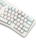 Alice Ergonomic Mechanical Keyboard With Rock Solid Aluminum Frame And Tri Mode Wireless Bluetooth Pairing Hot Swap Qmk Via Tuning Knockout Rgb Lighting Plus Pillow Wrist Rest For Smooth All Day Typing Vibes close-up view of key layout and color scheme