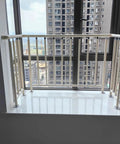 No Drills No Drama Drill Free Balcony Guardrail with alloy frame at a high-rise window, providing safety for apartments.