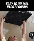 Person installing MegaFilter 20x20x1 Air Filter MERV 13 Activated Carbon Tech Defense in HVAC slot