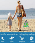 Mother and child at the beach with a Six Pack Mesh Drawstring Bag 14 By 17 Inches carrying colorful balls, ideal for multipurpose storage.