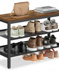 Rock Solid Three Tier Shoe Rack Bench With Heavy Duty Steel Frame And Rustic Plank Shelves Featuring Protective Raised Edges For Mudroom Seating Or Living Room Chill Spot with various shoes and a handbag.