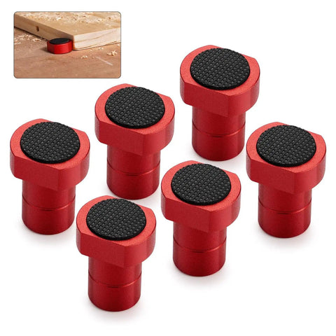 Eight red aluminum bench clamps with non-slip rubber inserts, used on a wooden surface, 8 Piece Aluminum Woodworking Bench Clamps With Non Slip Rubber Inserts Three Quarter Inch 19mm Secure Your Pieces While Milling, Cutting, And Sanding For Built Tough Workbench Stability And Easy Grip.