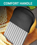 Crinkle cutter with stainless steel wavy blade and black ergonomic handle; potato fries slicer.