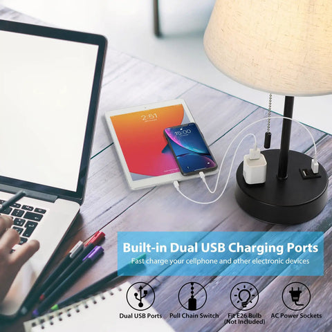 Set Of 2 Modern Nightstand Lamps With USB And AC Ports Great For Your Bedroom And Living Room Small Desk Lamps Ivory White Barrel Fabric Shade Silver Metal Base Linen Finish And Easy USB Charging For A Cozy Nighttime Vibe shown with devices charging.