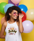 Woman wearing Birthday Queen Iron On Transfer Kit tank top against colorful balloons background.