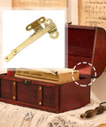Antique Brass Lid Stay Hinges Left Side Only 2 Pack gold finish for jewelry boxes, shown with open vintage wooden box on table.