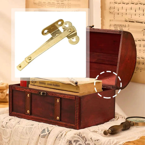 Antique Brass Lid Stay Hinges Left Side Only 2 Pack gold finish for jewelry boxes, shown with open vintage wooden box on table.