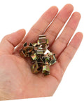 50 Pack Hella Tough U Shape Nut Fasteners For Automotive Body Clips Heavy Duty Metal Exterior Trim Replacement held in hand.