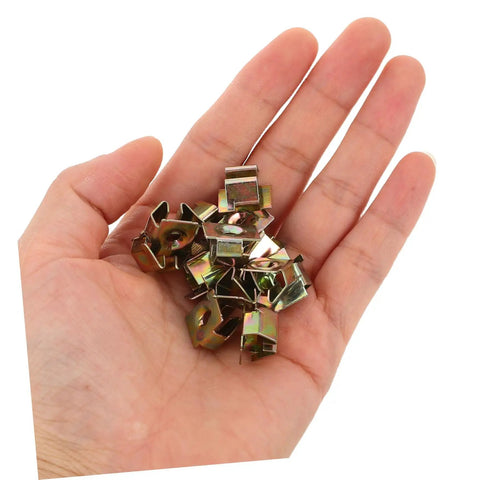 50 Pack Hella Tough U Shape Nut Fasteners For Automotive Body Clips Heavy Duty Metal Exterior Trim Replacement held in hand.