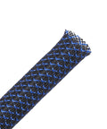 Close-up of 100 Ft Half Inch PET Expandable Braided Cable Sleeving Black Blue for Auto Audio and HDMI Wiring, texture detail.