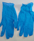 Blue protective gloves included with the Marine Grade Anti-Corrosion And Anti-Seize Lubricant In A 16oz Bottle For Sailboat Rigging.