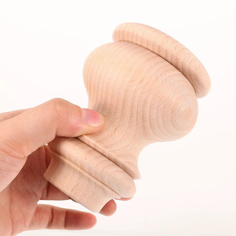 Wood Furniture Leg Replacement For Sofa Chair Dresser in brown wood showing side profile with hand holding it for scale.
