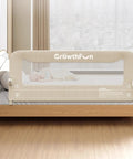 Foldable Toddler Bed Rail 59 Inch Reinforced Carbon Steel Frame With Connectors shown on bed, cream fabric, child asleep.