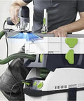Ultra-Flexible Dust Extractor Hose D27/32mm Compatible With Festool Systems used with a track saw in a workshop.