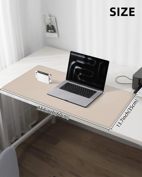 Beige PU Leather Desk Pad Protector And Mouse Pad Large 31.5 By 15.7 Inch on desk with laptop and accessories.