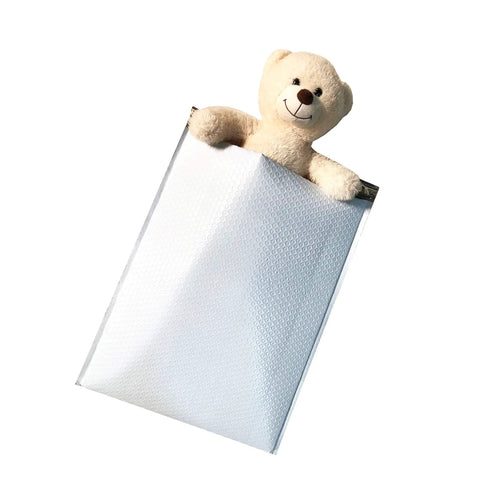 Extra Large 14.5x19 Bubble Mailer 15 Count Poly Envelope With Bubble Lined Cushioned Interior Tear Proof Water Resistant Self Sealing Lightweight Padding For Safe Postage Saving Shipments containing a teddy bear