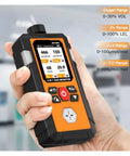 Hand holding All In One 4 In 1 Gas Leak Detector With Oxygen O2 Ex Hydrogen Sulfide H2S And Carbon Monoxide CO Portable Monitor