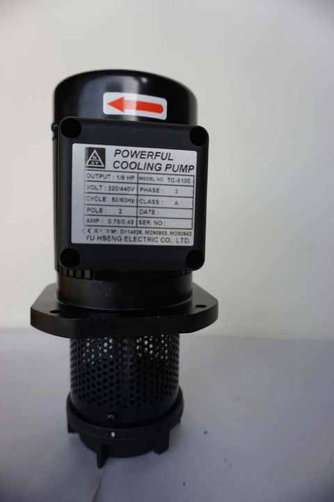 Machine tool coolant pump, front view, black metal unit with mounting flange.