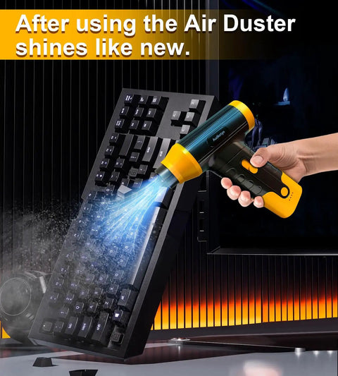 Hand using Powerful Cordless Electric Air Duster And Blower For Tech Cleaning Keyboard PC And Cameras on a keyboard