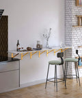 Kitchen countertop with gold brackets similar to Beefy 20 Inch Heavy Duty Black Countertop Support Brackets For Wall Mounted Shelving.