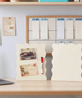 Four Piece Scalloped Magnetic Memo Boards Set For Desk Or Wall Display with photos and pen on desk in home office