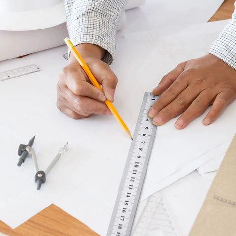 Person using one of the Set Of 6 Heavy Duty Stainless Steel Rulers 40 Inch Yard Sticks For DIY Pros And DIYers Woodworking School And Crafting