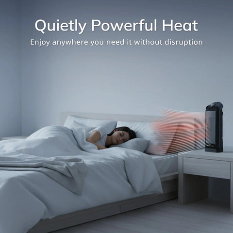 Oscillating Ceramic Tower Space Heater with Adjustable Thermostat and Two Quiet Heat Settings in bedroom next to bed