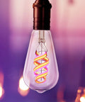 Smart Spiral LED Filament Edison Bulb With RGBW Color Changing Dimmable 60W Equivalent 2.4GHz WiFi Enabled Works With Alexa And Google Home App Control Four Pack hanging in ambient room.