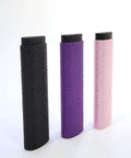 Reusable Skin File With Cover For Rock Climbing And Bouldering, Hand Callus Sander For Climbers shown in black, purple, and pink.