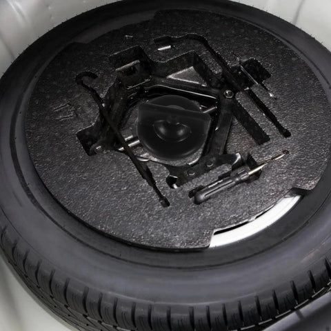 Spare Tire Bolt Retainer Clamp For CRV Durable Car Wheel Accessory with Easy Install shown in trunk with tool set.