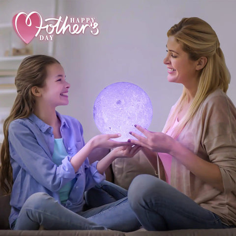 Mother and daughter holding an Upgraded 7 Inch Moon Lamp 3D Printed Moon Light With 16 Color Options Remote And Touch Control Realistic Crater Details Cozy Lit Night Light Gift For Women Teens Men White Hand Stand Included.