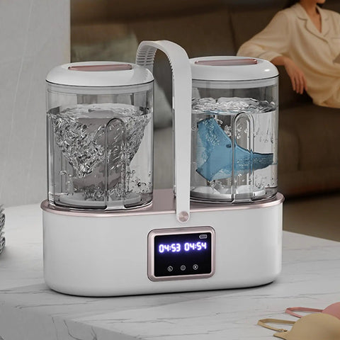 Slick Portable Ultrasonic Underwear Washing Machine With 4000mAh Cordless Battery For Dorms Hotels Rvs And Campsites No Sweat Top Tier Travel Laundry Care in action with two tubs washing garments.