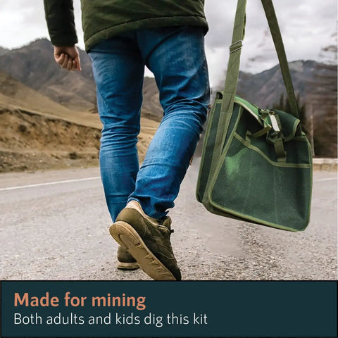 Person walking with green musette bag holding geology tools kit including rock pick hammer chisels magnifying glass for fieldwork.