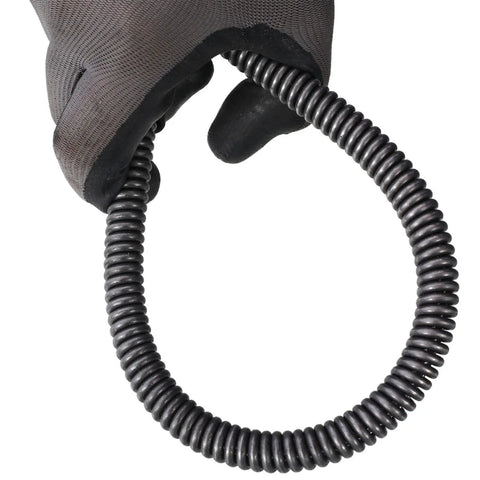 Close-up of a gloved hand holding a coiled flexible cable for the Professional Grade Electric Drain Auger Heavy Hitter.