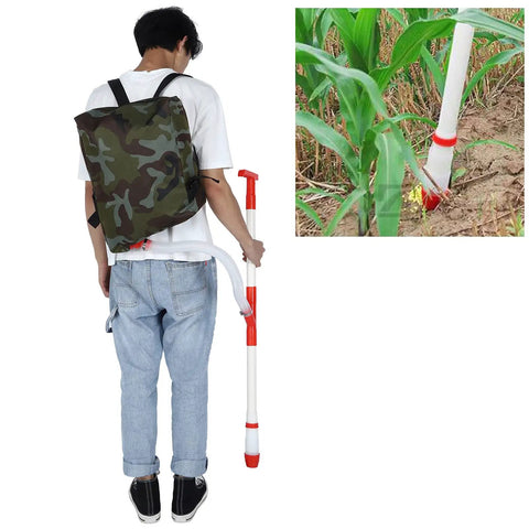 Person holding Manual Fertilizer Spreader With Bag For Farm Crops And Garden Use Accurate Measurement Fertilizing Tool near corn plant