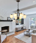 Living room with Six Light Large Chandelier With Alabaster Glass Shades In Oil Rubbed Bronze Finish, rustic farmhouse style.