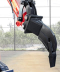 Pro Grade Mini Excavator Attachments Kit With Narrow Bucket Ripper Rake Auger Grapple Quick Hitch Screening Bucket Eight Piece Set For Compact Excavators US Stock Ready To Ship From Local Warehouse showing metal ripper tool attached to arm