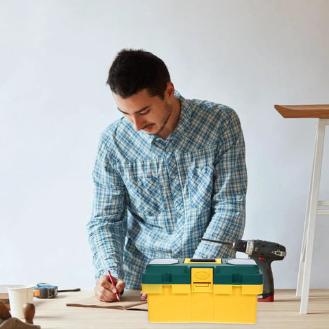 Man using Grab And Go Plastic Toolbox Featuring Nifty Small Parts Compartments For Weekend Warriors and Road Trips with drill.