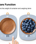 Ultra Slim Digital Kitchen Scale With 1G Precision And 11Lb Capacity showing tare function with empty and filled bowl