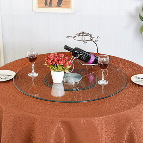 Tempered Glass Lazy Susan Turntable For Dining Tables And Banquets with wine, flowers, glasses, and smooth edge visible.