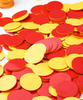 Two Sided Red And Yellow Counting Chips 1000 Piece Set scattered on a surface, ideal for preschool math manipulatives and activities.