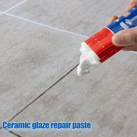 Hand applying All Purpose Tile Crack Filler Adhesive For Tiles And Surfaces High Strength Repair Paste For Ceramic Porcelain Glass Fiberglass And Stone Quick Set Smooth Spreading Durable Bond Glossy Finish Fast Acting Repair on tile crack