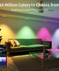 Living room with colorful lighting by Peteme E26 Retrofit LED Recessed Lighting 4 Inch, IC Rated ETL Certified, showing brightness control.