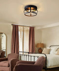 Cozy bedroom with 2-Light Farmhouse Flush Mount Ceiling Light in black finish, 11.4-inch rustic fixture with metal cage.